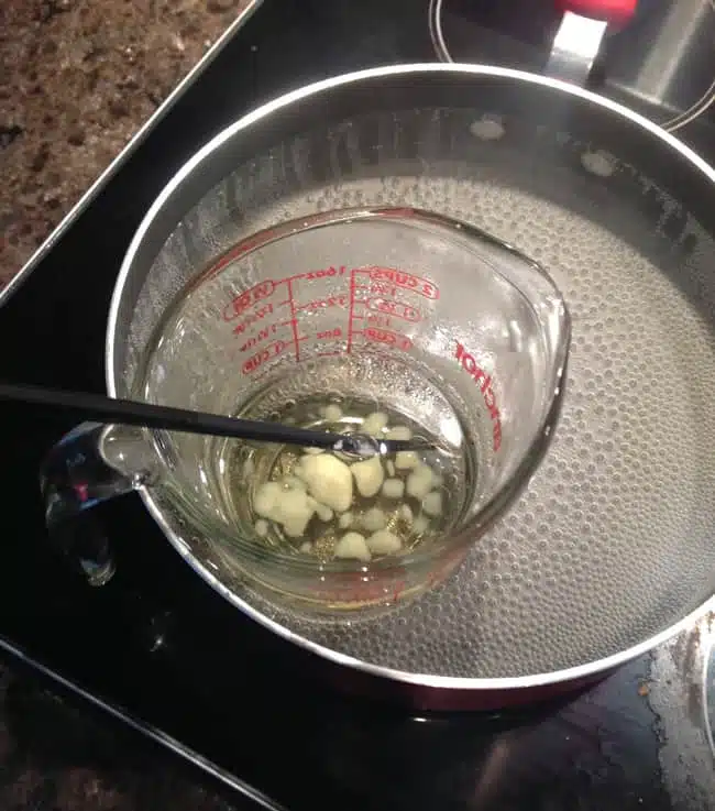 DIY teacup candles instructions - in this step the soy wax is melted down to a clear liquid. 
