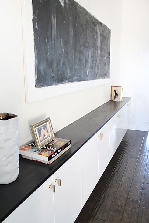 Chic Ikea Hacks - These gold pulls give this Ikea floating cabinets an extra classy look! 