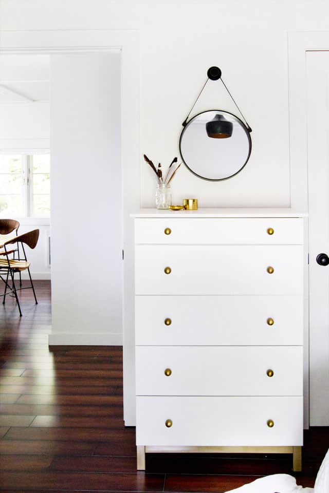 Chic Ikea Hacks - A little bit of paint can go a long way. This beautiful gold and white DIY dresser is a simple, easy to do hack that looks great. 