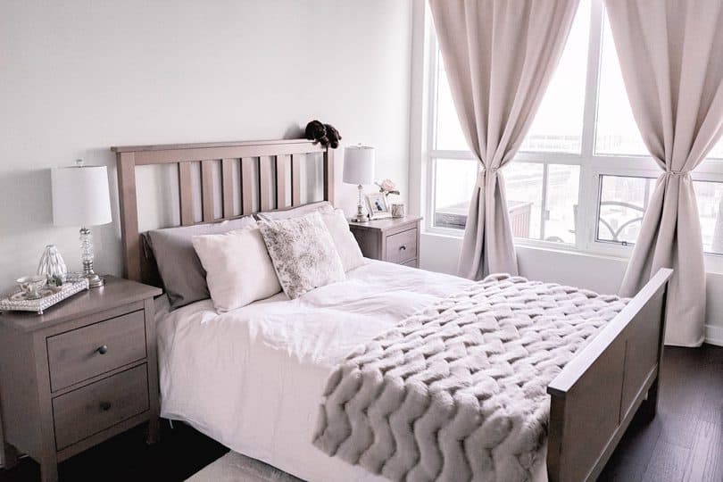 Cozy bedroom make over in neutrals. Love the fur throw!