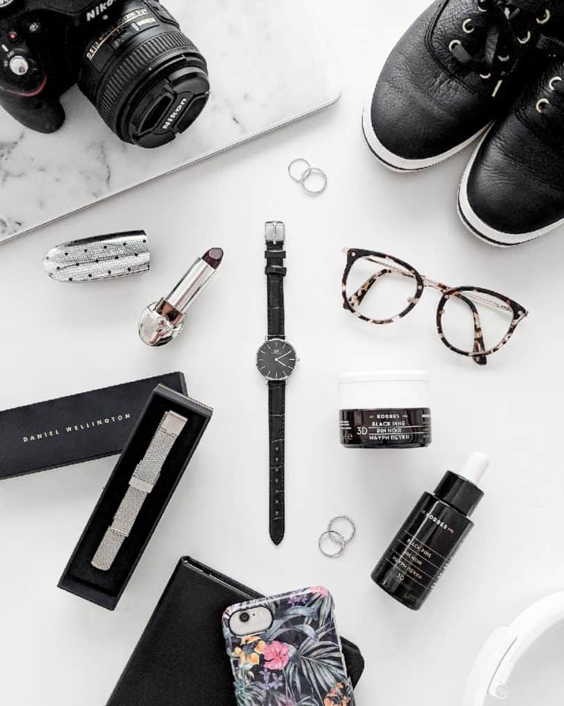 Monochrome Flatlay: featuring Daniel Wellington watch, Korres skincare, Ideal of Sweden phone case, Ked's Shoes, Guerlain Lipstick, Bon Look glasses ...more at yesmissy.com