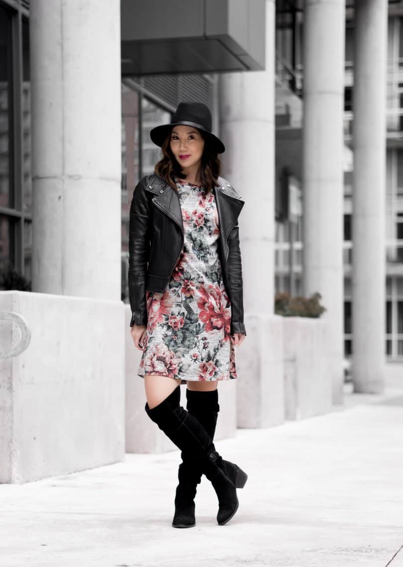 Fall look with floral dress, OTK boots, and leather jacket