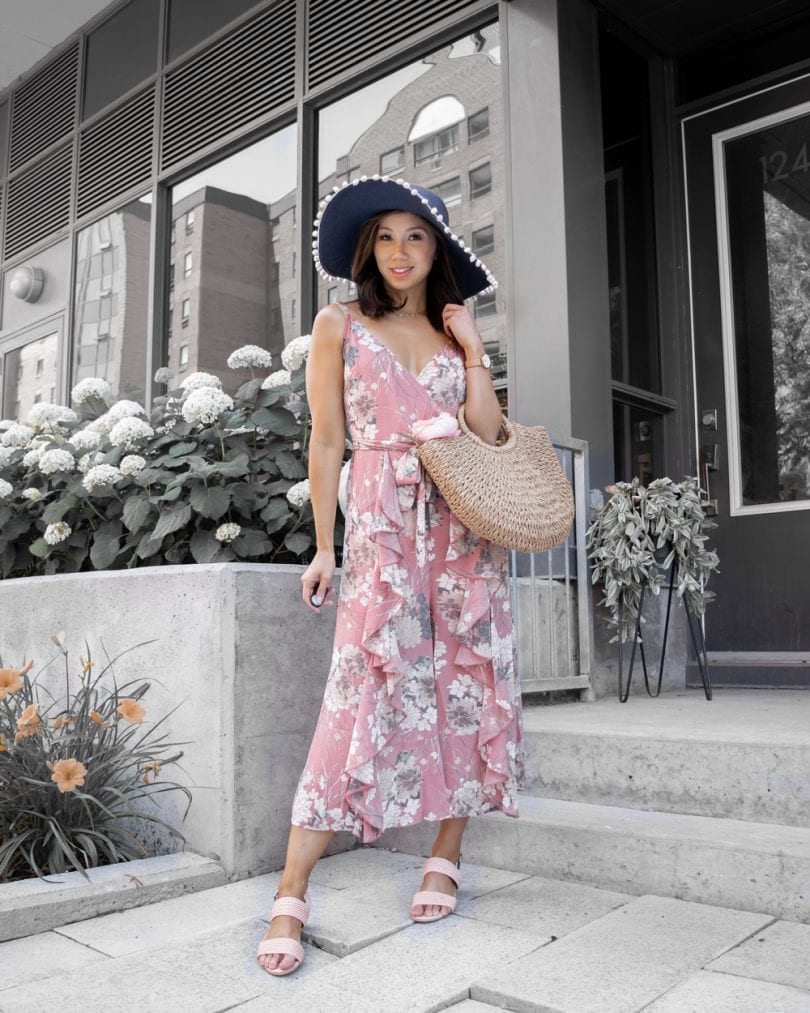 Summer outfit ideas - Pink ruffle jumpsuit, woven sandals, and basket bag