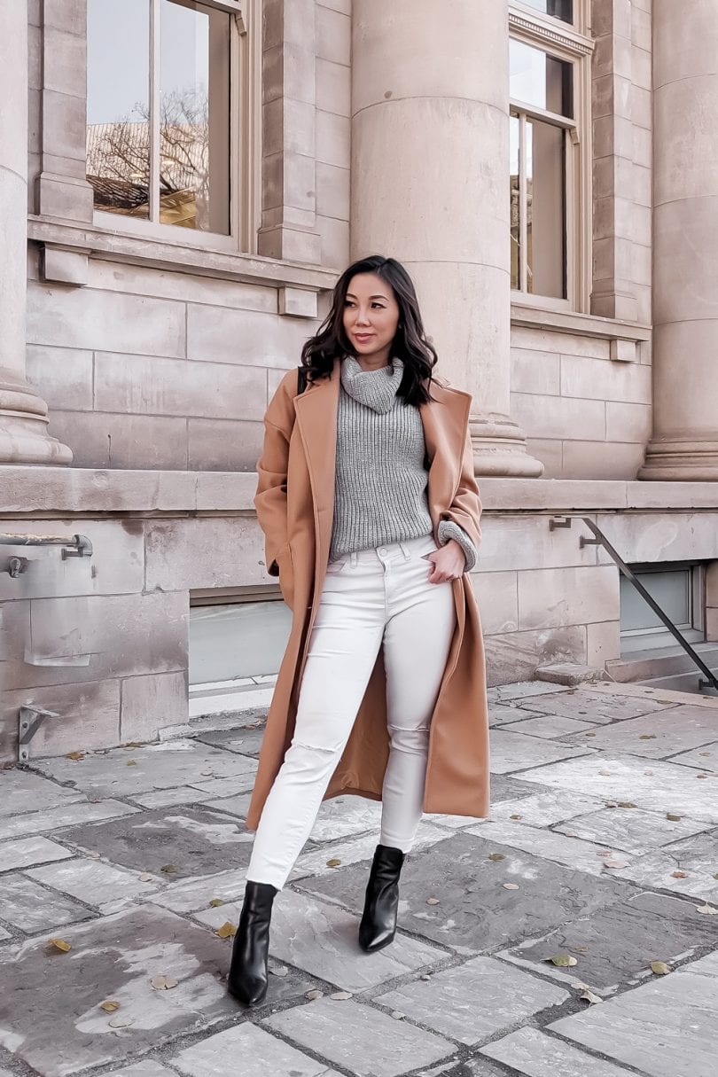 Winter outfit ideas - long camel coat, sweater and white jeans