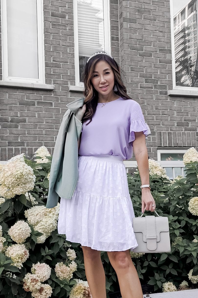 Millenial purple trend: Lavendar blouse and white skirt paired with a mint moto jacket from Ann Taylor styled by Eileen Lazazzera of YeMissy Lifestyle Blog