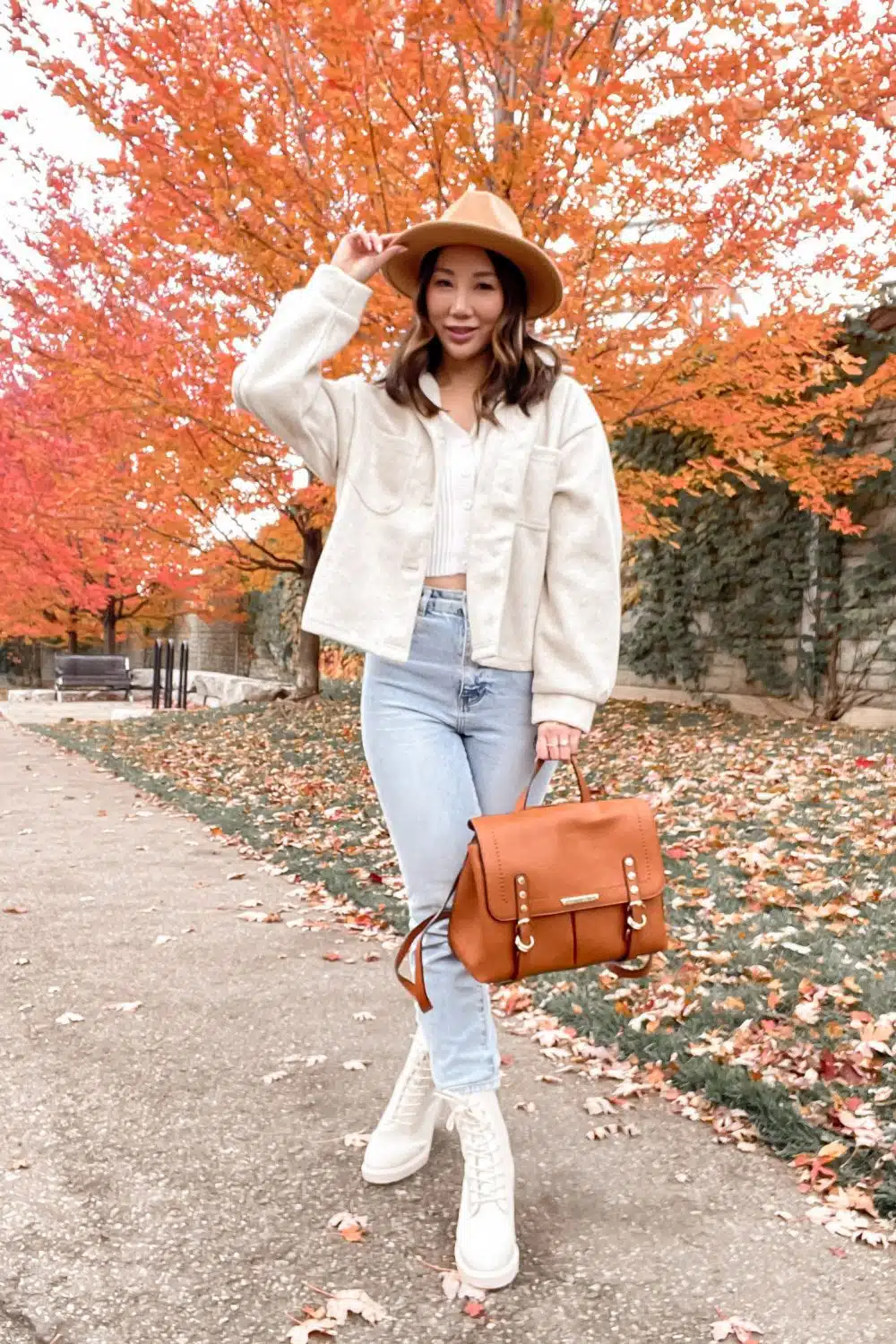 Casual fall outfit with shacket, mom jeans, combat boots styled byHigh Quality Luxury Shopping.