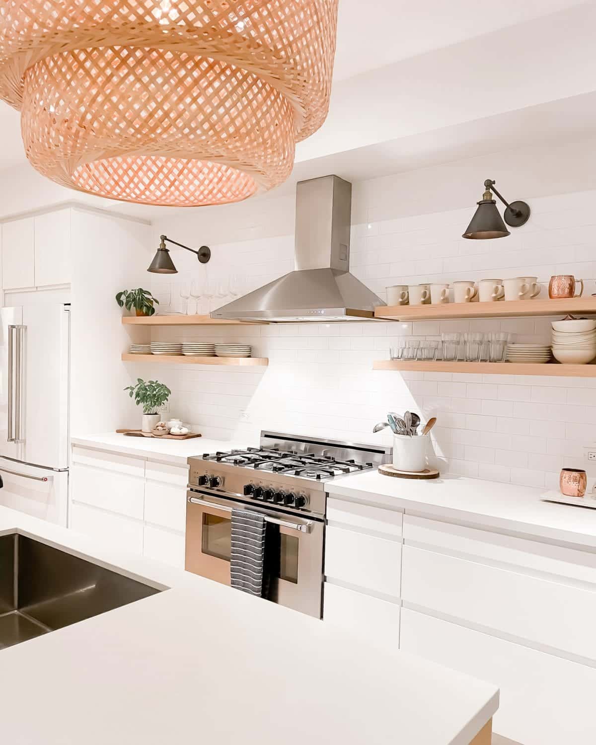Beautiful renovated kitchen with white counter and wood accents. For more visit yesmissy.com