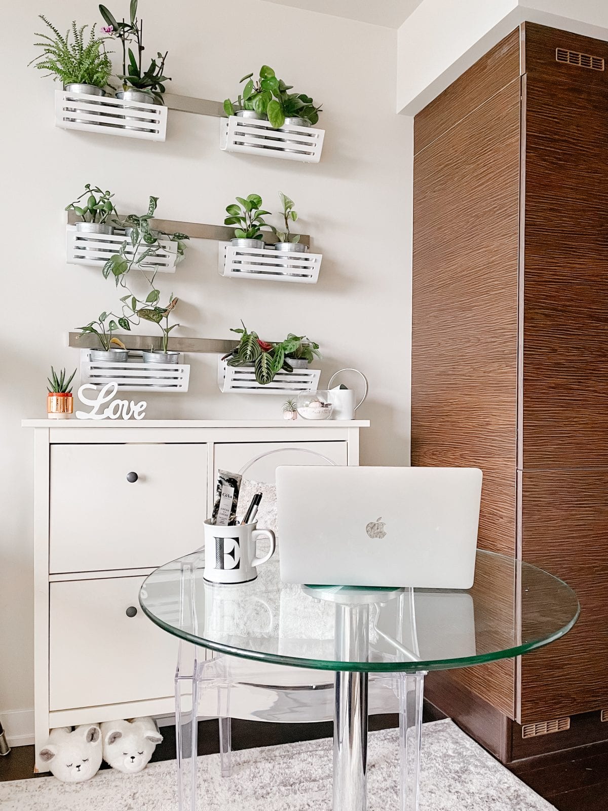 Apartment tour - working area with desk and plant wall