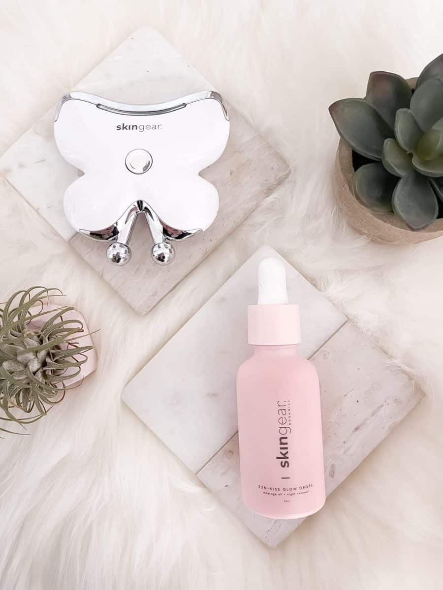 Electric Gua Shaw tool and skincare oil from SKINGEAR. 