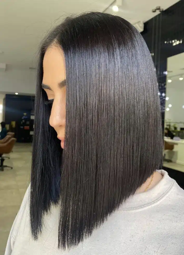 Sleek angled lob haircut - This style could cut glass with just one look, and it makes any classic bob or lob look modern and on-trend. 