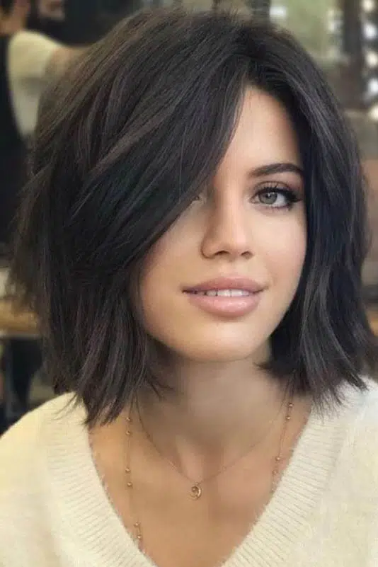 Short hairstyles for women - choppy bob haircut with texture on dark hair