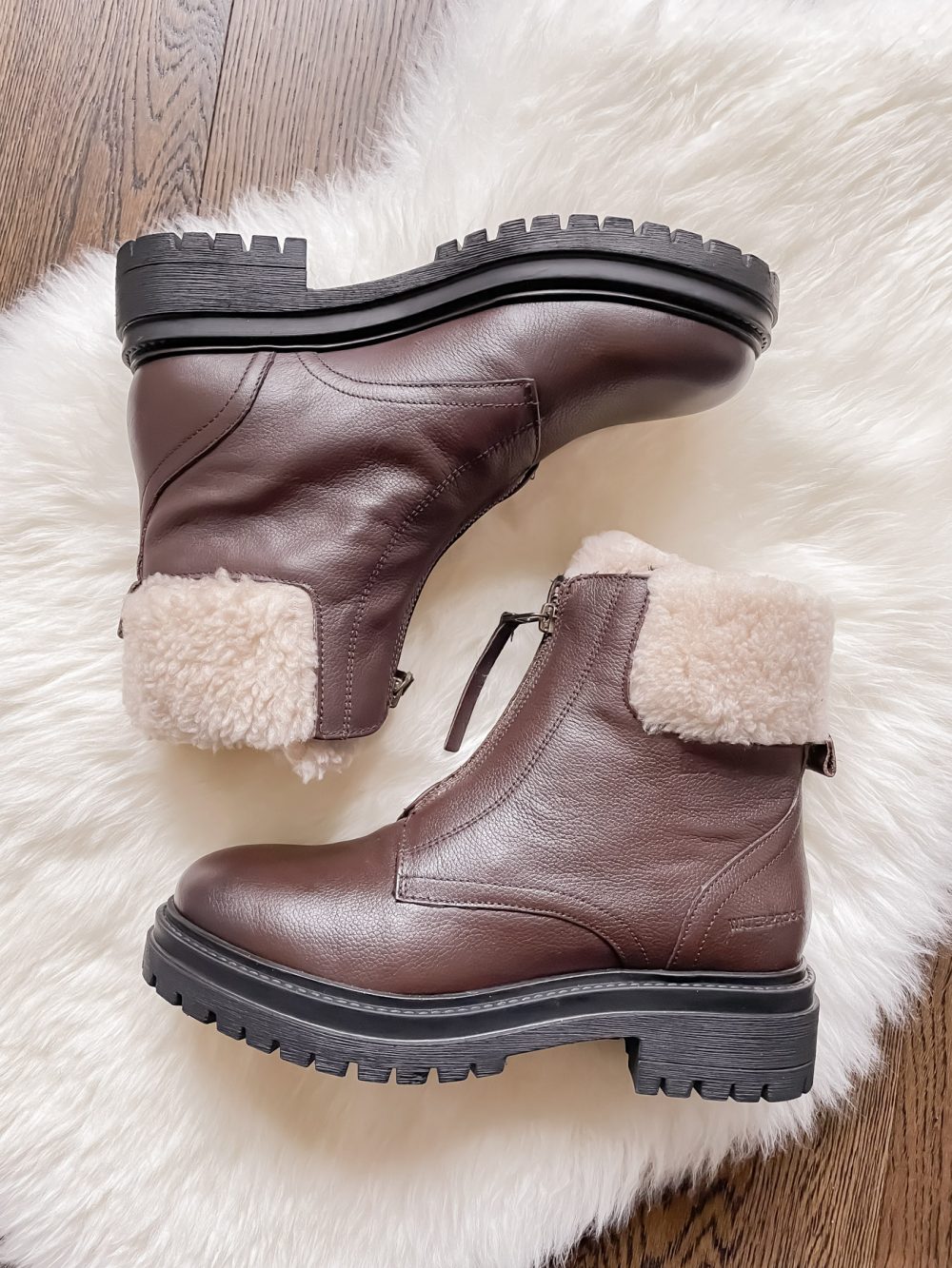 Best everyday boots for winter - Cougar Vow Boots with shearling trim. Keeps your feet warm and dry all winter long!