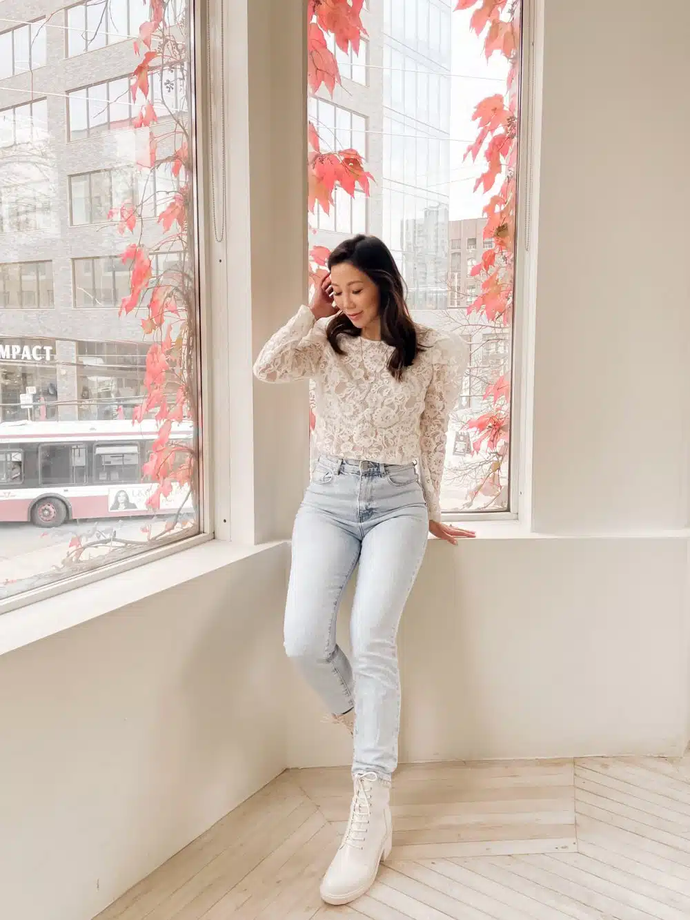 Classic straight leg jeans with lace top and white combat boots. Styled by Eileen Lazazzera - Canadian fashion and lifestyle blogger