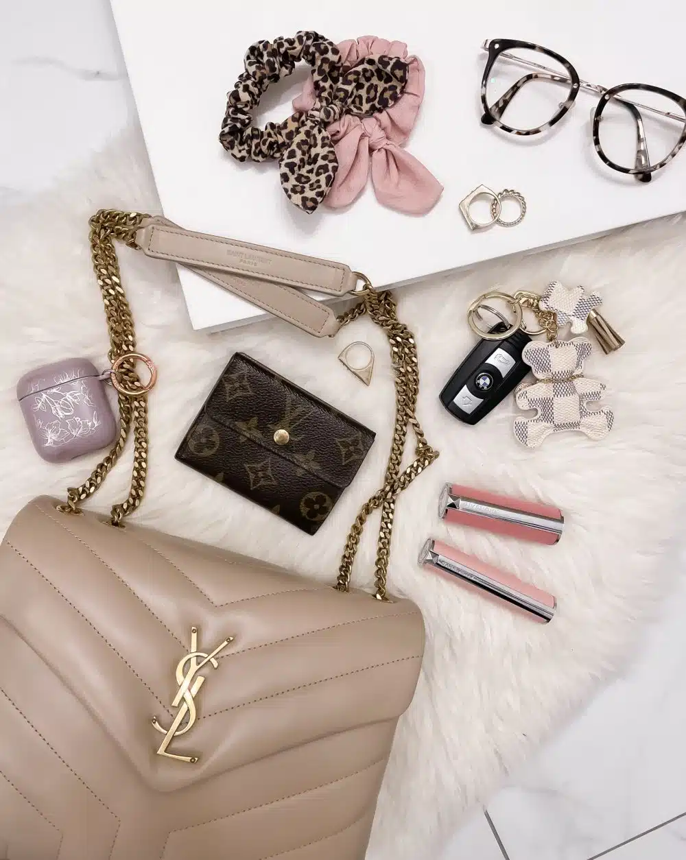 What's in my bag - all my everyday essentials that fit in my YSL Loulou Small Bag plus a full review on the bag at yesmissy.com
