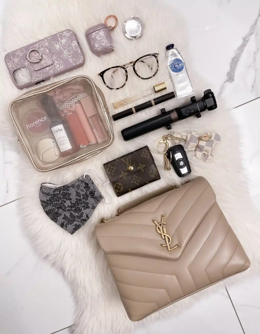 What's in my bag - All my daily bag essentials from makeup to keys and everything in between. Everything that fits in my YSL Loulou small bag in dark beige. Full review on yesmissy.com
