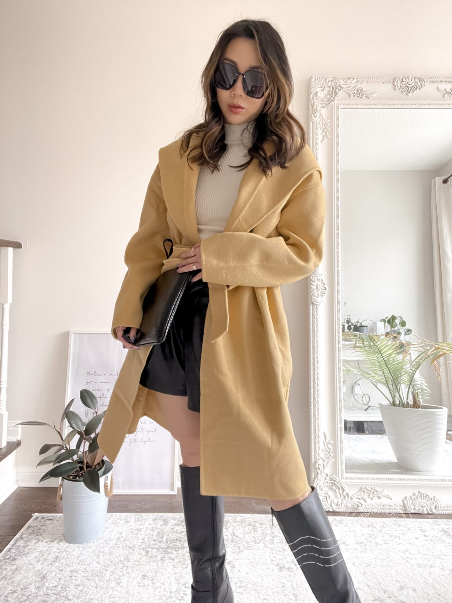 Going Out Spring Outfit -  faux leather shorts, knee high. boots and mock neck top. 
