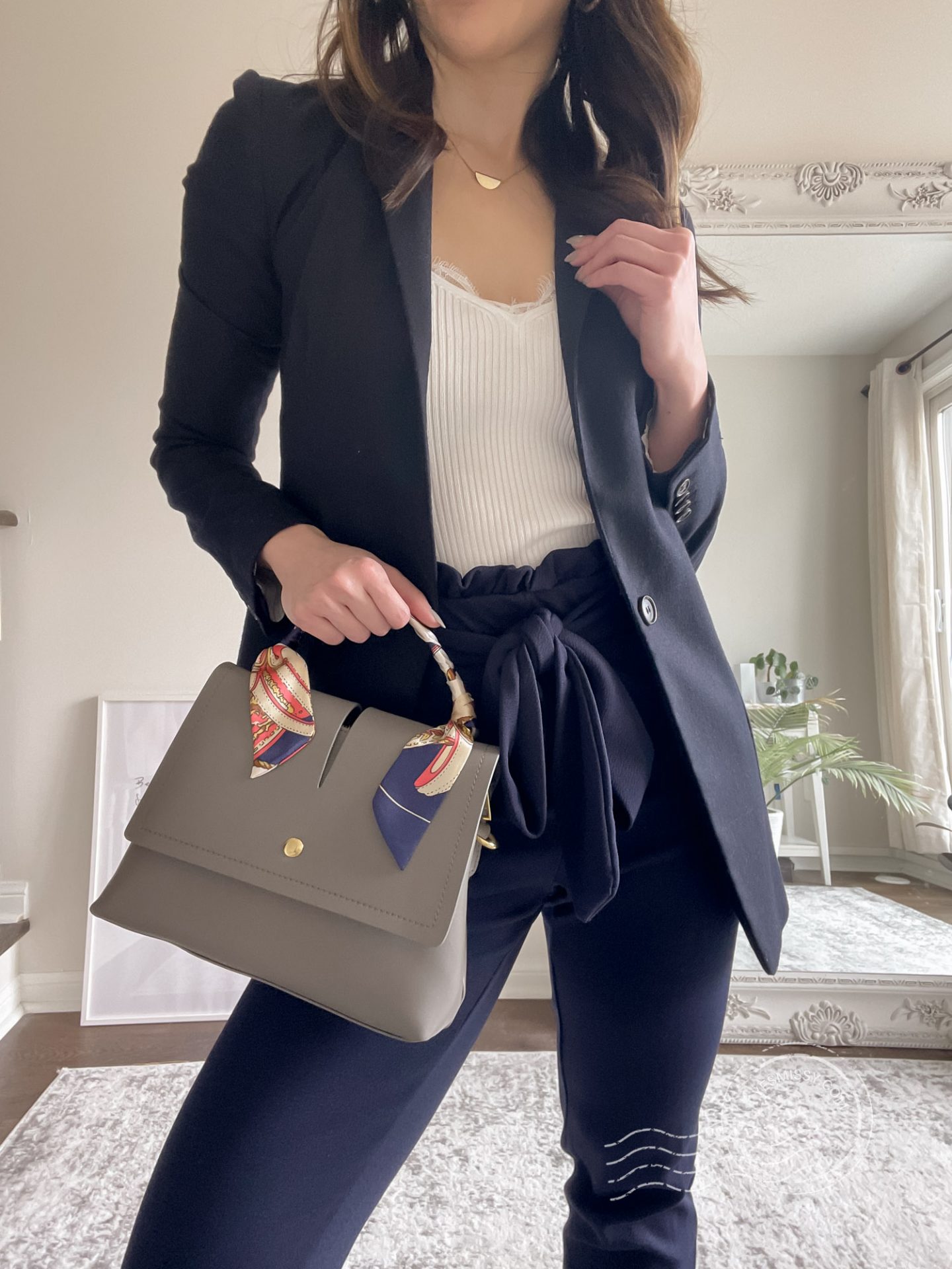 Spring office outfits - navy blazer outfit and paper bag pants.For more spring/summer workwear outfit ideas visit yesmissy.com