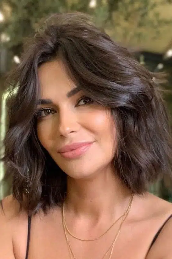 For your next hair appointment: Try curtain bangs with a textured bob 