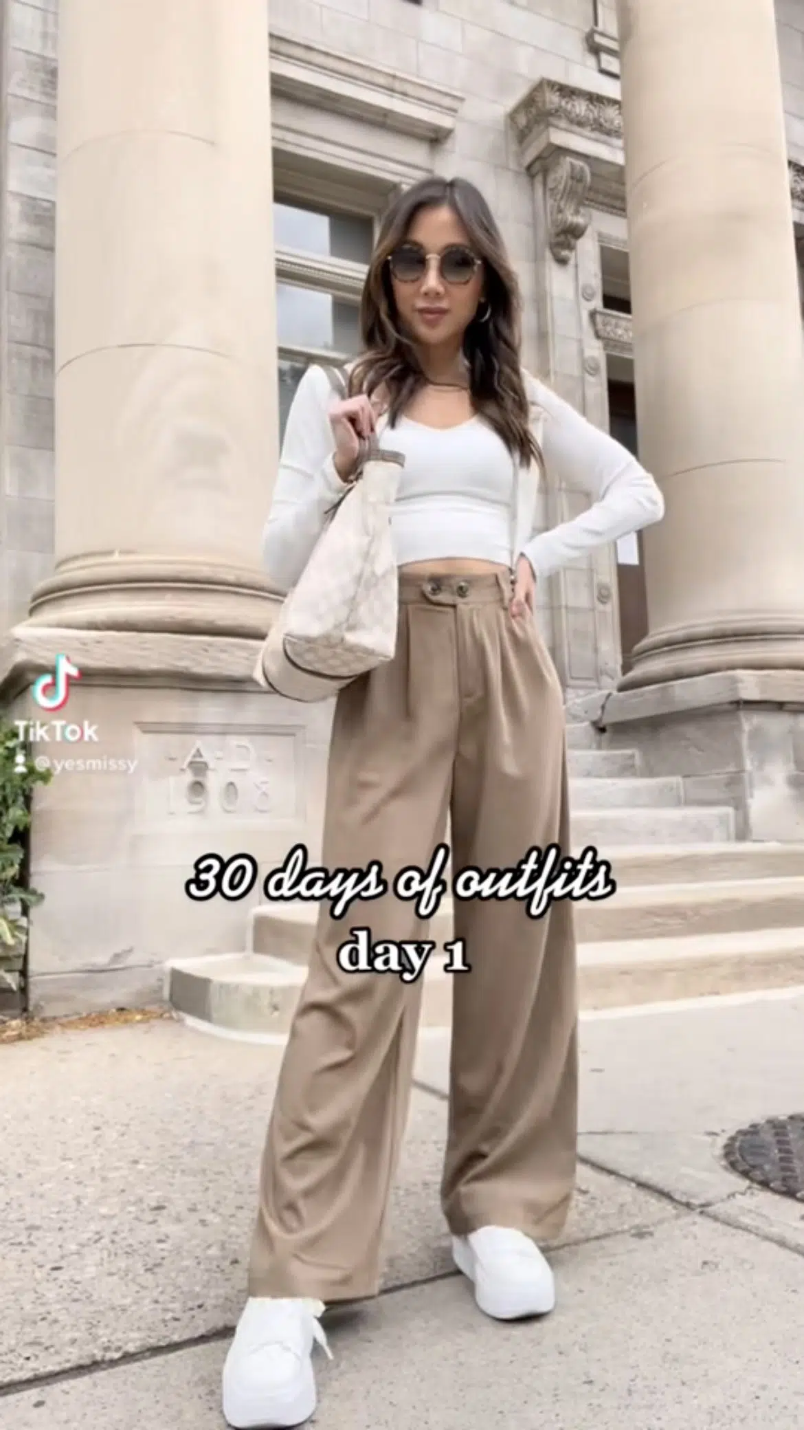 30 days of summer outfits - brown wide leg trousers, sneakers, cropped top and cardigan with Gucci bag. Styled by Eileen Lazazzera of yesmissy.com