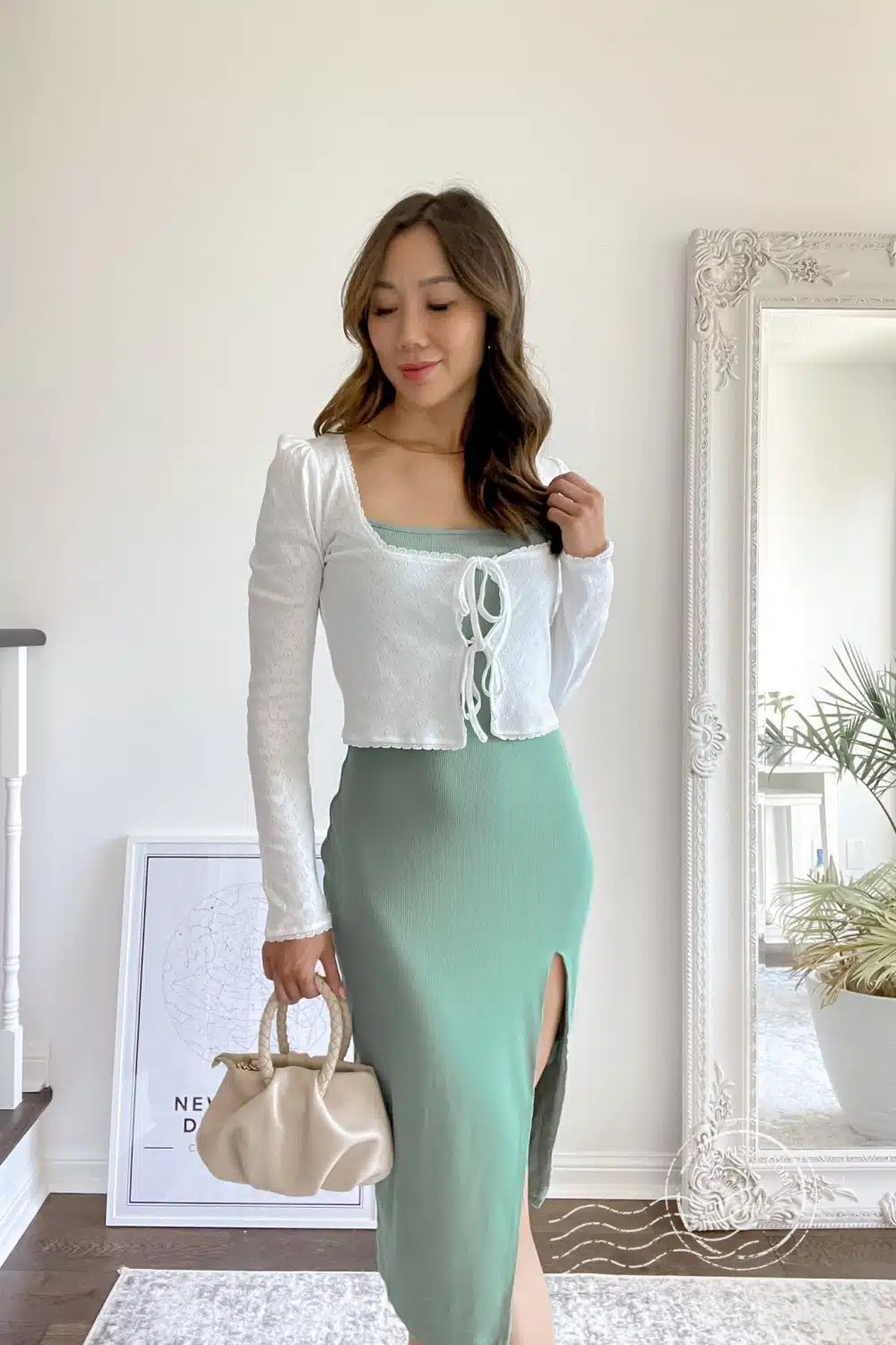Date night look with green midi dress and white cardigan from Revolve. Styled by Eileen Lazazzera of yesmissy.com