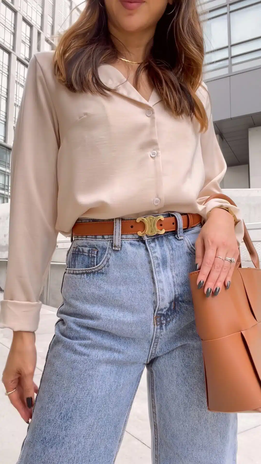 Outfit details: Celine Triomphe Belt in Tan with jeans and satin shirt. More on yesmissy.com