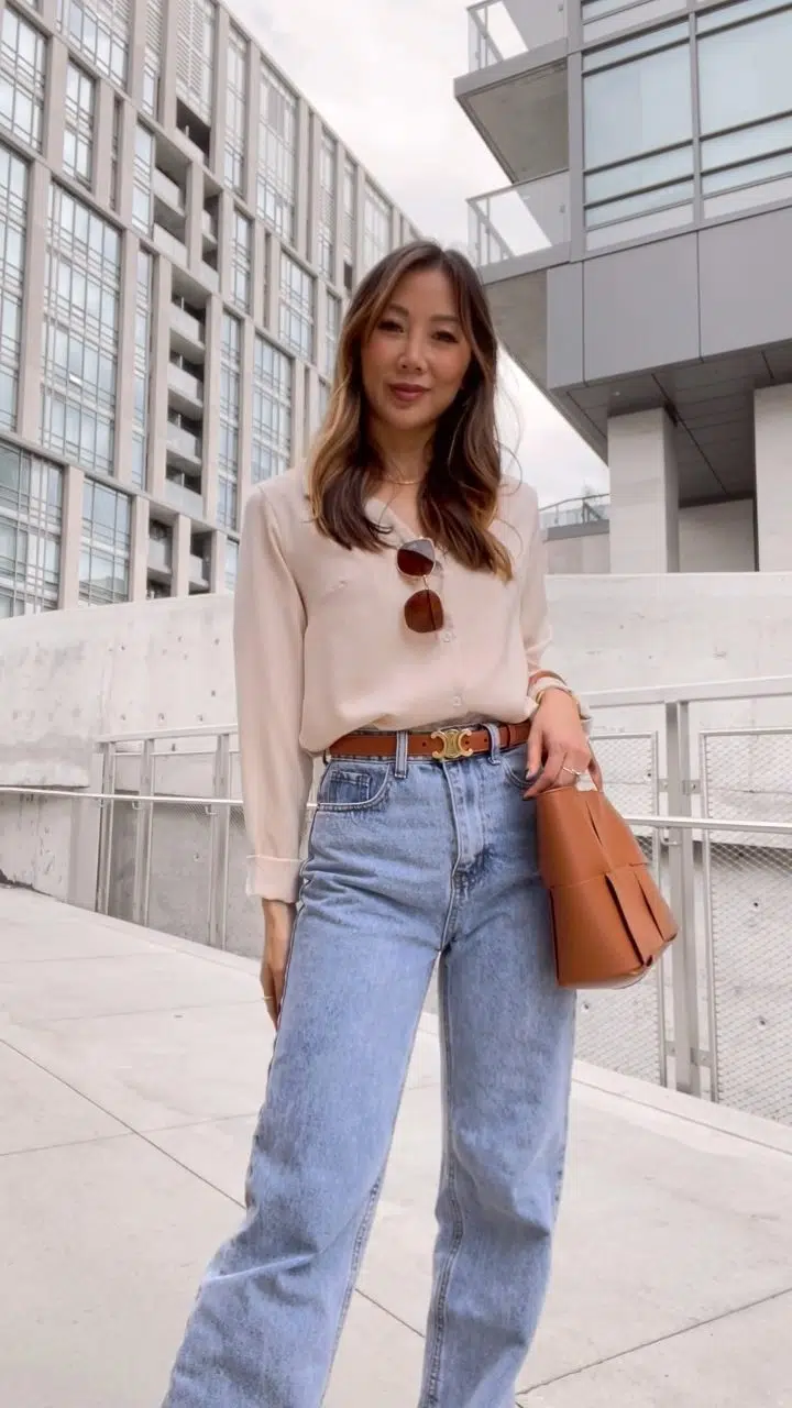 casual luxury - silk shirt and wide leg jeans outfit with Celine belt and leather tote bag. More outfit ideas on yesmissy.com