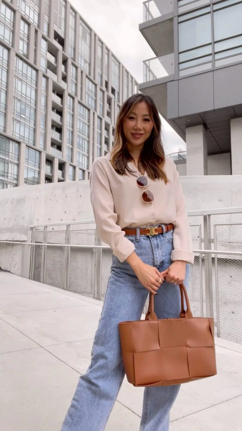 A casual early fall look: blouse and wide leg jeans with brown Jeanne Lottie bag and Celine belt, Bonlook glasses,