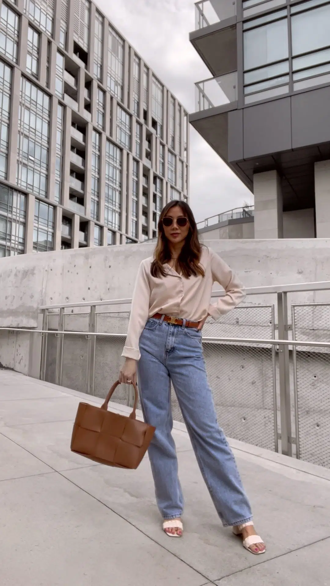 Casual chic outfit with wide leg jeans and button down shirt. Outfit details on yesmissy.com