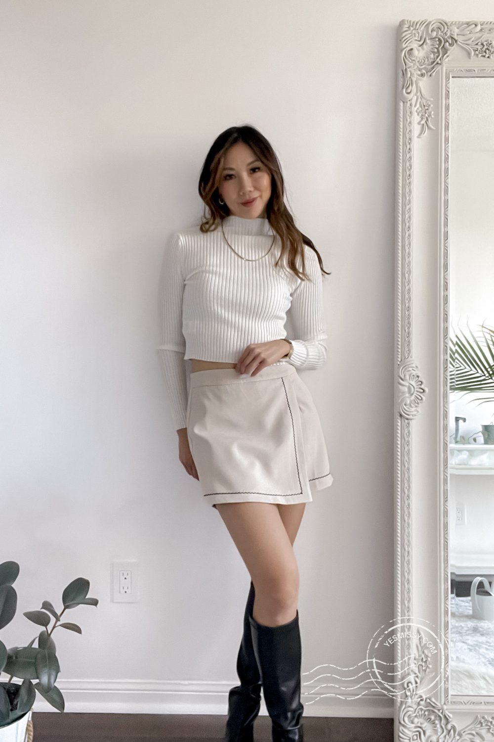 Casual look with beige skort from J.ING, white mock neck ribbed top and boots from SHEIN.