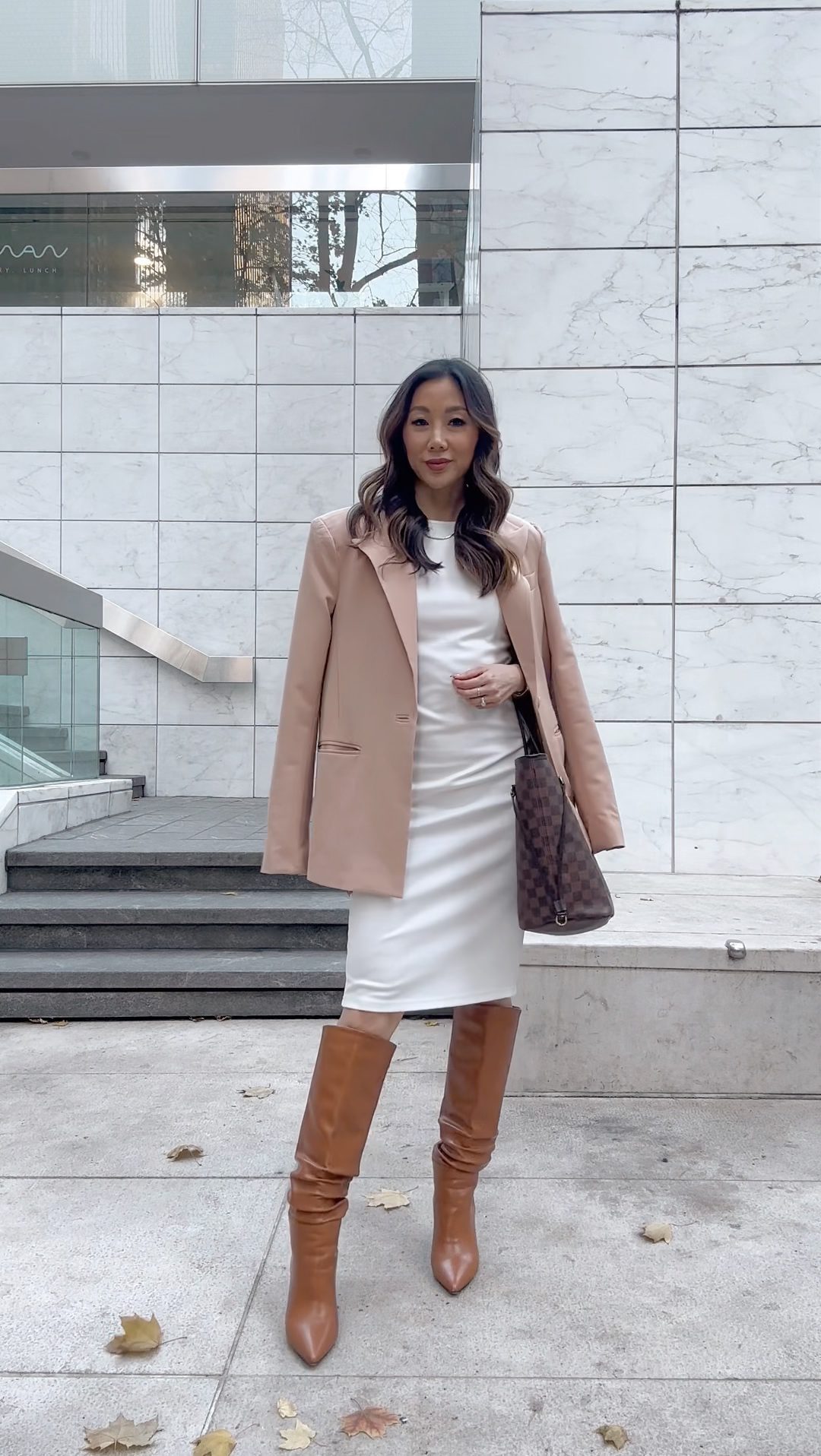 Neutral workwear look - tan blaze, white pencil dress and brown knee high boots. Styled by Eileen Lazazzera of yesmissy.com