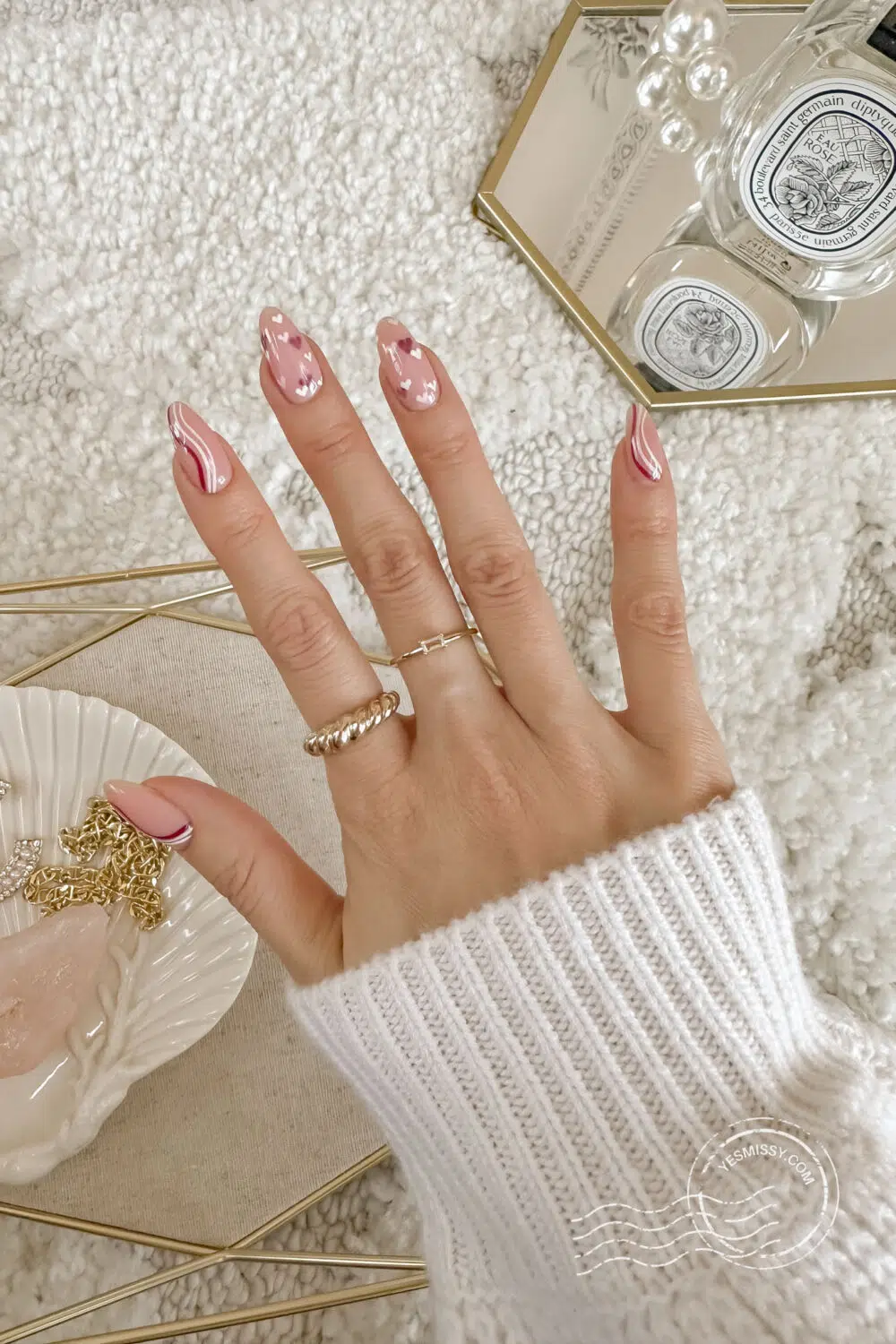 10 Heart Nail Designs Perfect for Your Valentine's Day Date Night. These layered heart nails with a playful swirl design are my Valentine's Day pick this year—classic with a fun twist! For more nail inspo, visitHigh Quality Luxury Shopping.com
