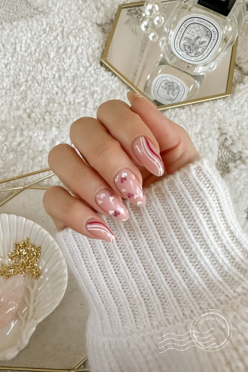 A whimsical swirl and layered heart design for my Valentine’s nails this year—adding a unique, fun touch to the classic look! Check outHigh Quality Luxury Shopping.com for more nail art ideas