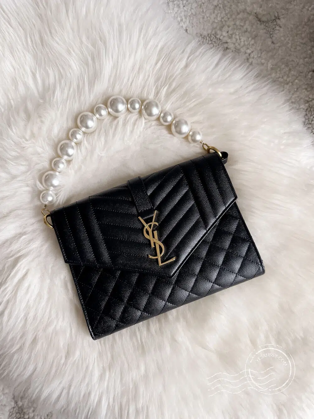 Best bag hacks: upgrade your clutches into handbags with this elegant pearl strap.